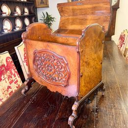 A Victorian burr walnut lidded music canterbury with amazing fretwork to both sides