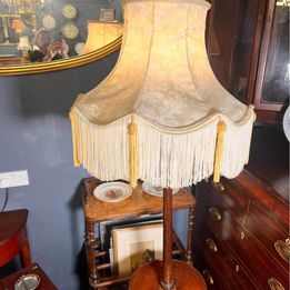 A wonderful mahogany standard reading light with a shelf for your book and Gin & Tonic