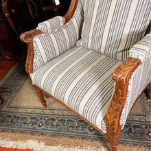 Load image into Gallery viewer, A French Louis XVI style walnut bergères chair from the 20th century in fabulous condition