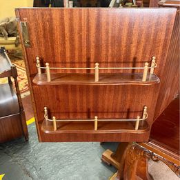 A burr walnut cocktail drinks cabinet with fantastic rich colour