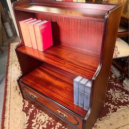 Mahogany campaign open bookcases in Georgian style having two shelves in a pillar form