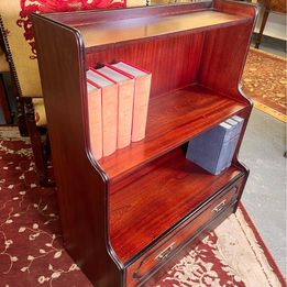 Mahogany campaign open bookcases in Georgian style having two shelves in a pillar form