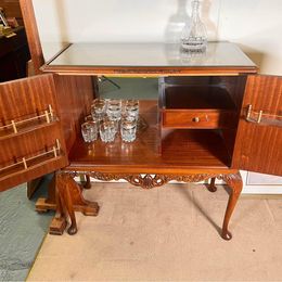 A burr walnut cocktail drinks cabinet with fantastic rich colour