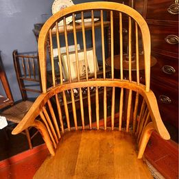 A handsome early Nineteenth Century yew and elm high back Windsor armchair