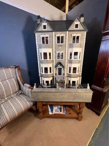 The "Cadogan Gardens" dolls house, built, painted, with deluxe decoration and lit with lighting