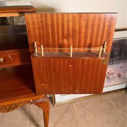 A burr walnut cocktail drinks cabinet with fantastic rich colour