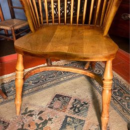 A handsome early Nineteenth Century yew and elm high back Windsor armchair