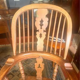 An attractive antique Windsor ash and elm farmhouse elbow chair