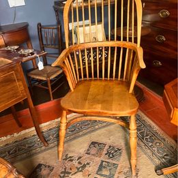 A handsome early Nineteenth Century yew and elm high back Windsor armchair