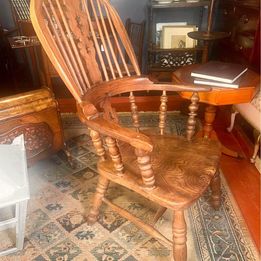 An attractive antique Windsor ash and elm farmhouse elbow chair