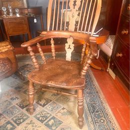 An attractive antique Windsor ash and elm farmhouse elbow chair