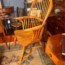 A handsome early Nineteenth Century yew and elm high back Windsor armchair