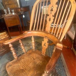 An attractive antique Windsor ash and elm farmhouse elbow chair