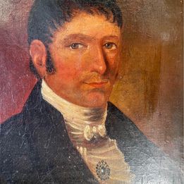 An original 18th century oil on canvas portrait of a handsome gentleman wearing a black jacket