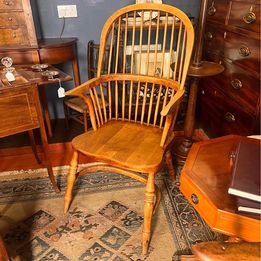 A handsome early Nineteenth Century yew and elm high back Windsor armchair