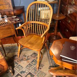 A handsome early Nineteenth Century yew and elm high back Windsor armchair