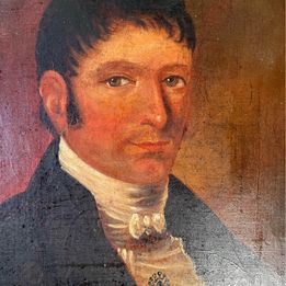 An original 18th century oil on canvas portrait of a handsome gentleman wearing a black jacket