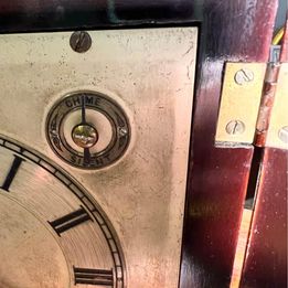 A Fabulous Flame Mahogany Four Glass Library Mantel Clock