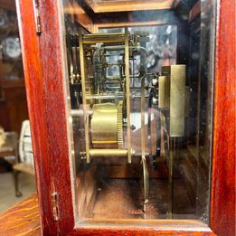 A Fabulous Flame Mahogany Four Glass Library Mantel Clock