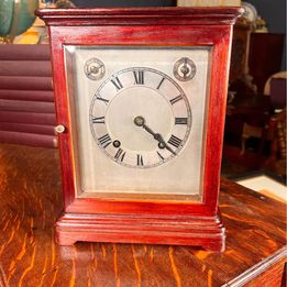 A Fabulous Flame Mahogany Four Glass Library Mantel Clock