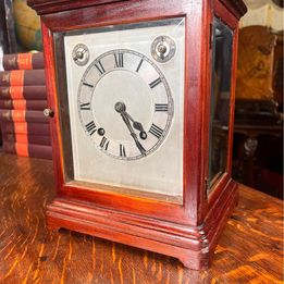 A Fabulous Flame Mahogany Four Glass Library Mantel Clock