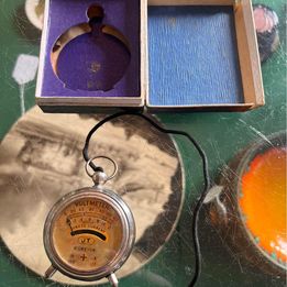 Vintage JT handheld pocket watch voltmeter in its original box