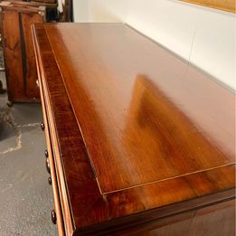 A Victorian Flamed Mahogany Lancashire chest of drawers with mother of pearl handles