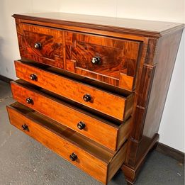 A Victorian Flamed Mahogany Lancashire chest of drawers with mother of pearl handles