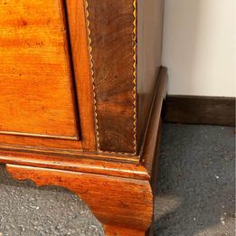 A Victorian Flamed Mahogany Lancashire chest of drawers with mother of pearl handles