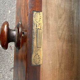 An antique Victorian walnut chest of drawers, faced with burr walnut fronts