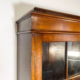 A Lovely Arts And Crafts Oak Bureau Bookcase with tooled leather writing area