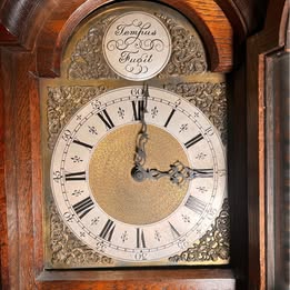 A Lovely Long Cased Tempus Fugit Oak Clock With Westminster Chime