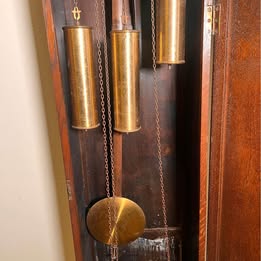 A Lovely Long Cased Tempus Fugit Oak Clock With Westminster Chime