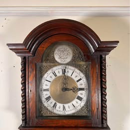 A Lovely Long Cased Tempus Fugit Oak Clock With Westminster Chime