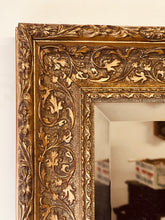 Load image into Gallery viewer, A large impressive antique French Louis XIV style carved giltwood wall mirror