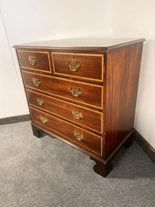 An Antique Mahogany Chest Of Drawers With Crossbanded Drawer Fronts