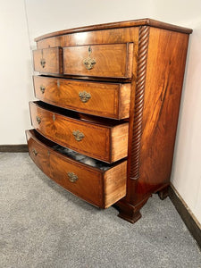 An Empire Bow Front Five Drawer Chest With Rope Turned Columns
