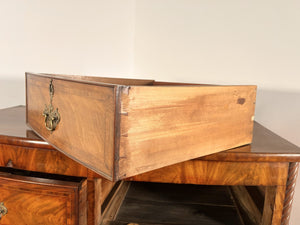 An Empire Bow Front Five Drawer Chest With Rope Turned Columns