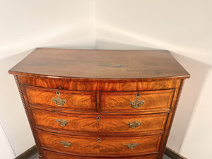 An Empire Bow Front Five Drawer Chest With Rope Turned Columns