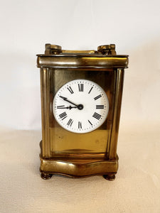 A Fully Glazed Classic Corniche Polished Brass Carriage Clock With A Fine White Enamel Dial