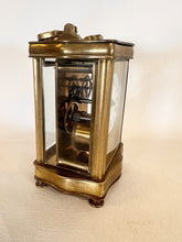 Load image into Gallery viewer, A Fully Glazed Classic Corniche Polished Brass Carriage Clock With A Fine White Enamel Dial