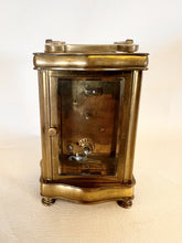 Load image into Gallery viewer, A Fully Glazed Classic Corniche Polished Brass Carriage Clock With A Fine White Enamel Dial