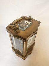 Load image into Gallery viewer, A Fully Glazed Classic Corniche Polished Brass Carriage Clock With A Fine White Enamel Dial