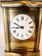 Load image into Gallery viewer, A Fully Glazed Classic Corniche Polished Brass Carriage Clock With A Fine White Enamel Dial
