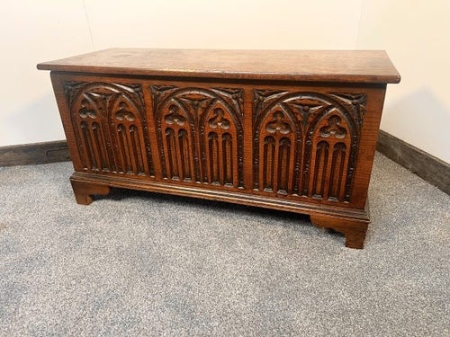 A Georgian Style Oak Coffer Featuring Deeply Carved Gothic Arcading And Panelled Front