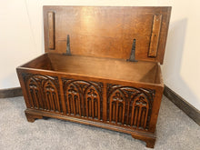 Load image into Gallery viewer, A Georgian Style Oak Coffer Featuring Deeply Carved Gothic Arcading And Panelled Front