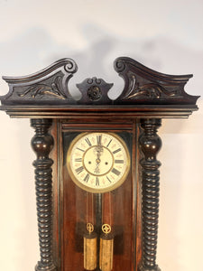 A 19th Century Walnut Cased Vienna Style Wall Clock With Twin Train Weight Driven Movement