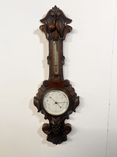 A Huge Edwardian Carved Oak Aneroid Barometer And Thermometer