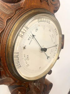 A Huge Edwardian Carved Oak Aneroid Barometer And Thermometer