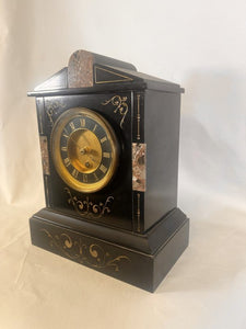 A Victorian Black Slate Mantel Clock Timepiece With Skeletonised Dial Bearing Gilt Roman Numerals